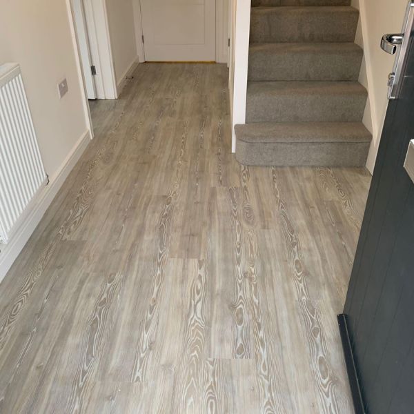 Amtico Spacia LVT - White Ash Wide Plank installed in entrance hall