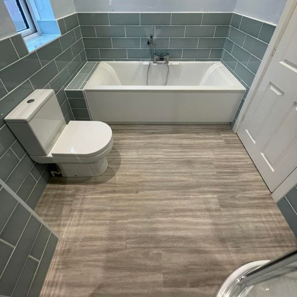 Arctic Grey Oak LVT installed in bathroom