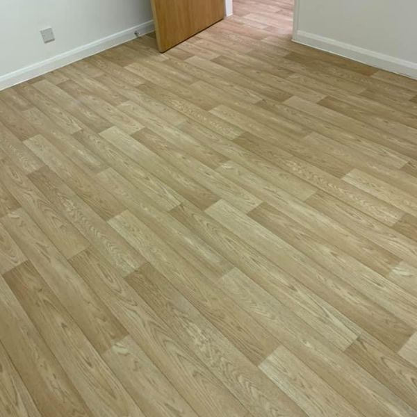 Non Slip Safety Vinyl - American Oak fitted in lounge