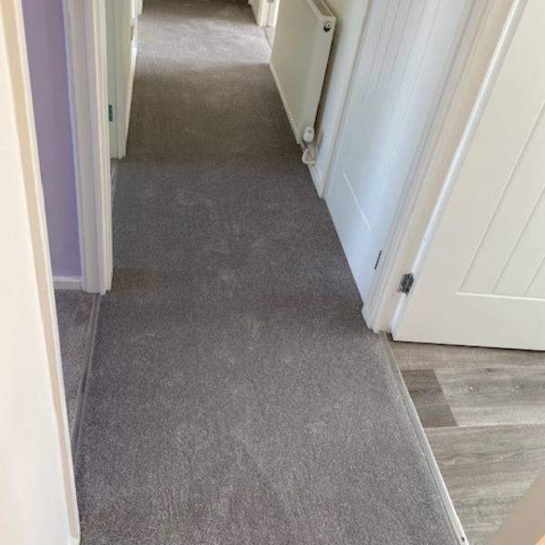 Pride Twist Carpet in Grey installed on the landing of a home in Telford