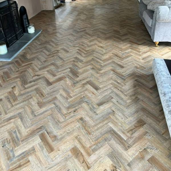 LVT Herringbone style flooring installed in a living room in Northampton