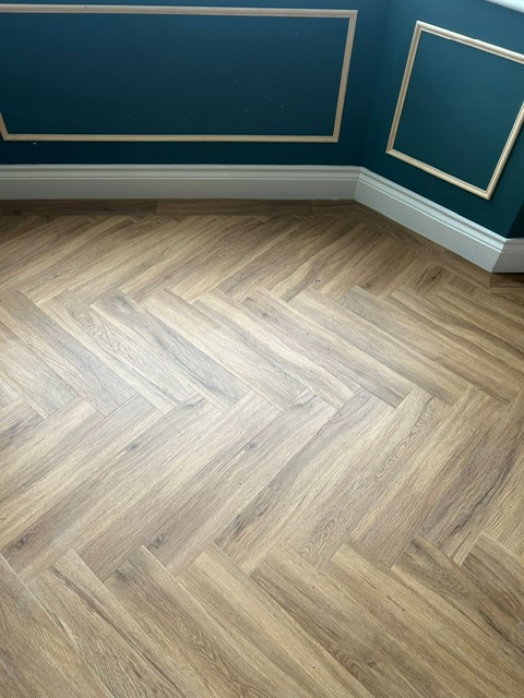 Studio Designs LVT - California Oak - Herringbone style laid in lounge in Northampton