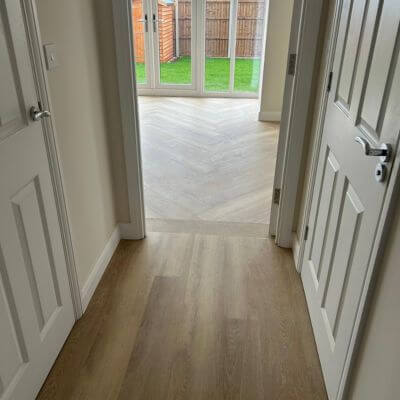 Brampton Chase Luxury Vinyl Tile in Blonde Oak installed Straight in Hall leading to Herringbone style in Conservatory in Northamptonshire