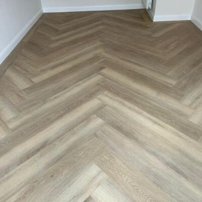 Brampton Chase Luxury Vinyl Tile in Blonde Oak installed in Study in Herringbone style with straight edging in Northamptonshire