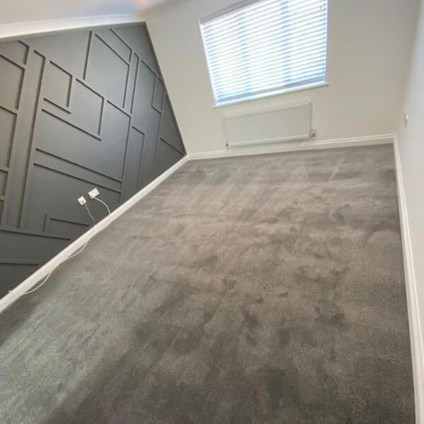 Tribeca carpet in the colour elderbark installed  in bedroom in a Northampton home