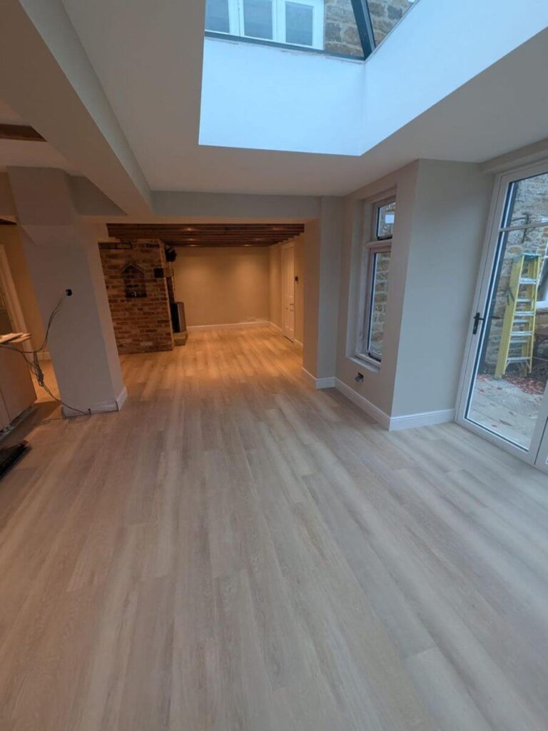 Light toned LVT Flooring laid in a Kitchen Extension in Sywell, Northampton