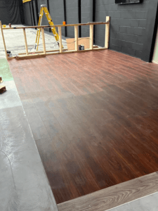 Vinyl flooring being installed at a Padel Tennis Centre in Northampton